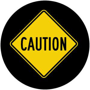 Projected yellow CAUTION diamond gobo for marking hazard areas on warehouse floors — CYANvisuals